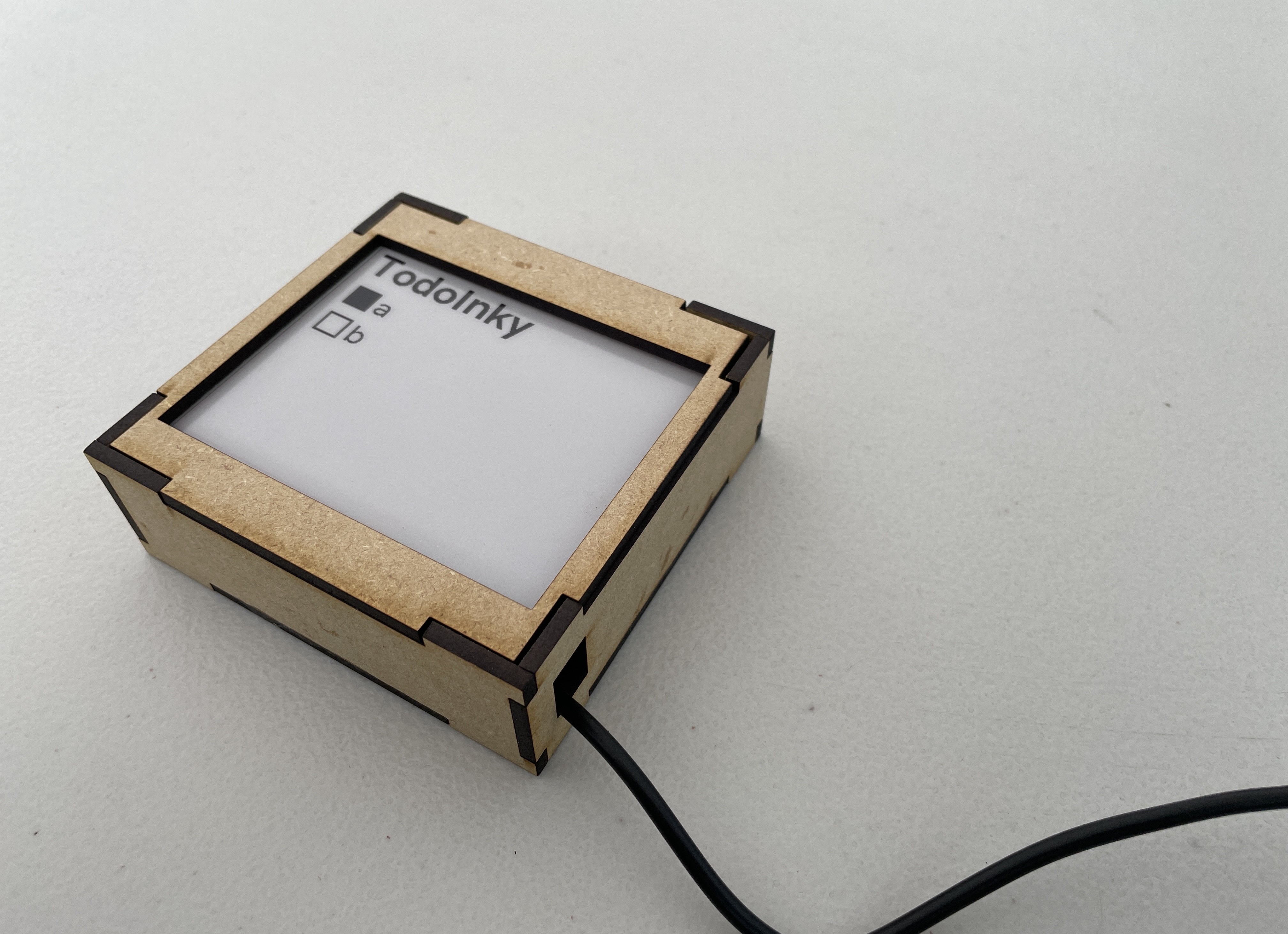 TodoInky with a wooden enclosure